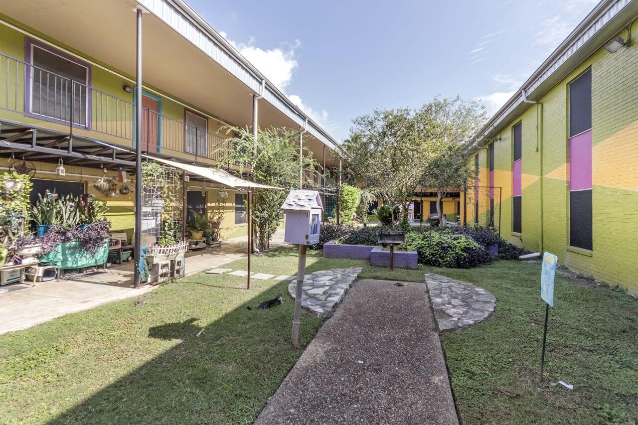 The courtyard between buildings at The Metropolis Apartments