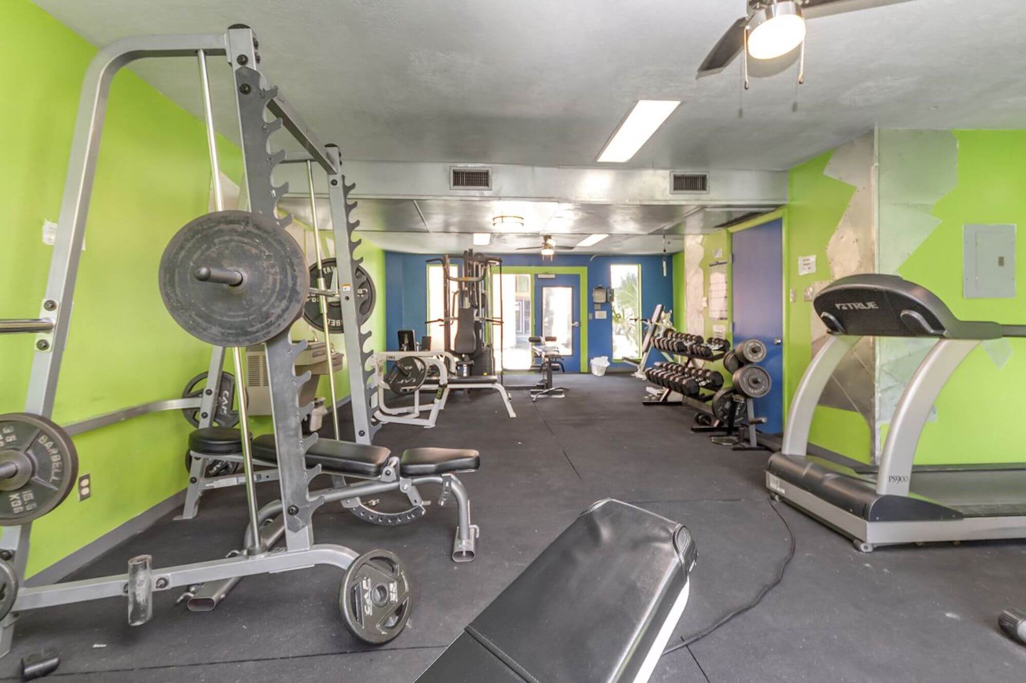 The gym at The Metropolis Apartments